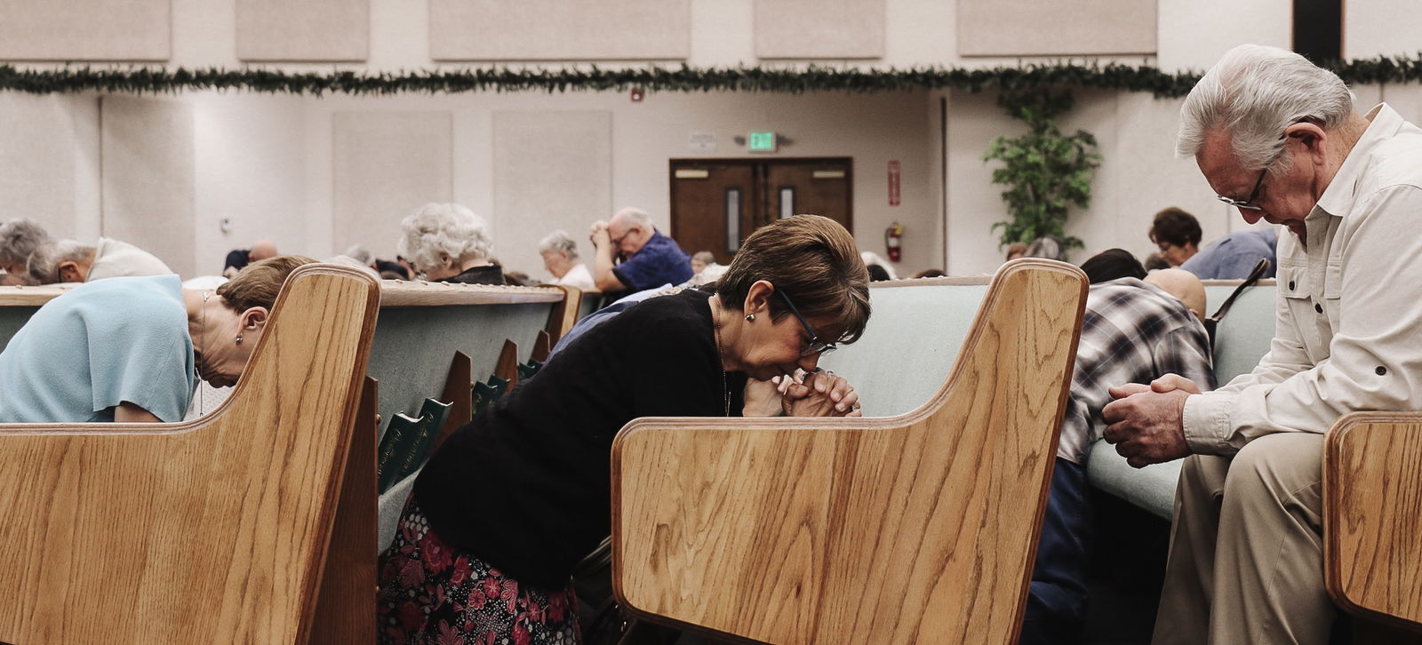 People praying kneeling